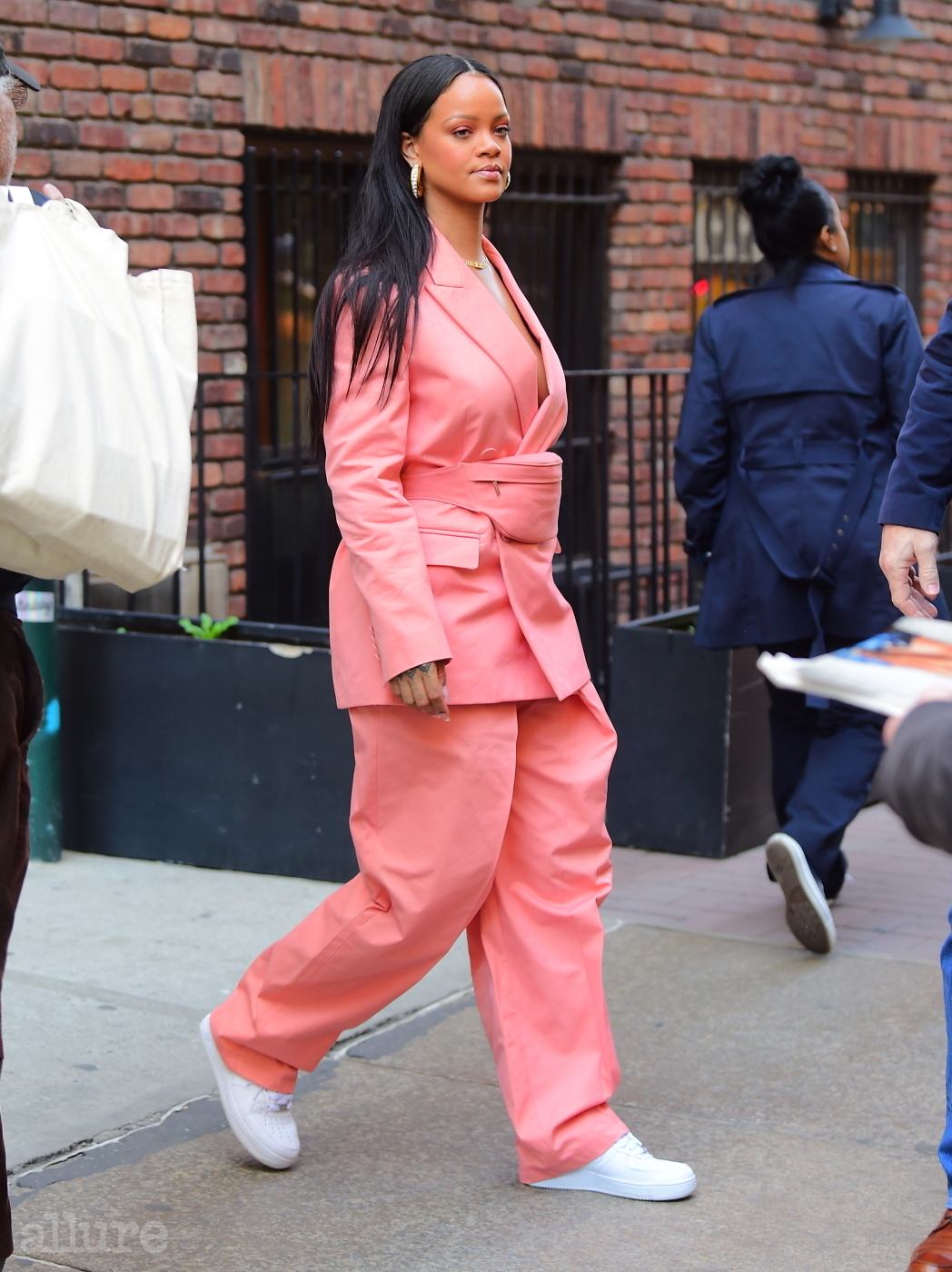 EXCLUSIVE: Rihanna Leaves Business Lunch Wearing Chic Oversized Coral Pant Suit . She looked amazing in a casual oversized pant suit with a matching fanny pack. She stopped to sign autographs for a fan before hopping into her SUV. Pictured: Rihanna Ref: SPL5080727 170419 EXCLUSIVE Picture by: DIGGZY / SplashNews.com Splash News and Pictures Los Angeles: 310-821-2666 New York: 212-619-2666 London: 0207 644 7656 Milan: 02 4399 8577 photodesk@splashnews.com World Rights, No Portugal Rights